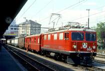 RhB VALSERZUG 5736 von Ilanz nach Landquart am 11.05.1994 in Chur mit E-Lok Ge 4/4I 604 - Z 94 - Haikv 5128 - Haikv 5126 - Haikv 5105 - Haikv 5119 - Haikv 5101 - Haikv 5102.
