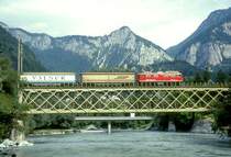 RhB VALSERZUG 5736 von Ilanz nach Landquart am 02.09.1997 auf Rheinbr�cke bei Reichenau mit E-Lok Ge 4/4I 610 - Haikv 5131 - Haikv 5126 - Haikv 5123 - Haikv 5105 - Uce 8087 - Uce 8004.
