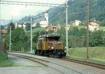 RhB G�TERZUG 5238 von Disentis nach Landquart am 27.08.1997 in Tavanasa mit E-Lok Ge 6/6I 411 solo. Hinweis: Lok nach Unfall 09.02.2000a - zur Zeit ausgestellt Deutsches Museum M�nchen