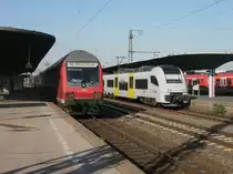 Hier links eine RB27 von Koblenz Hbf. nach Rommerskirchen und rechts 460 016-9 als MRB26 von K�ln Messe/Deutz nach Mainz Hbf., diese beiden Z�ge standen am 14.10.2010 in K�ln Messe/Deutz.