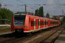 111 175-6 + 111 180-6 mit 425 052-8 + 426 030-3 als �berf�hrung in M�nchen-Heiemranplatz am 14.08.2010