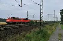 115 332-9 hatte 110 466-0 samt PbZ am Haken,als sie an meiner Linse vor�ber fuhr (06.08.10 Dedensen-G�mmer)