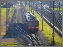 S1 1521 mit Be 4/4 514 in der Ausweiche Zizers. (17.11.2010)