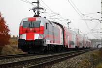 Der aktuellste Werbetaurus der �BB. 1116 264 am 1.11.2005 mit einem Regionalzug auf dem Weg nach Wien zwischen Paffst�tten und Gumpoldskirchen an der S�dbahn