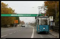 Triebwagen 80 der Interessengemeinschaft Nahverkehr Rhein-Neckar am 01. November am Zementwerk.

Und dazu der in dieser Serie obligatorische Hinweis an einen Admin: Wie man dem Bauwerk im Hintergrund und der Kategorie entnehmen kann, befinden wir uns in Heidelberg.