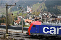 Am Kirchlein von Wassen vorbei -

... it is not a car but a cargo-locomitive. Re 484 in Wassen.

01.11.2005 (M)