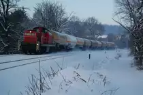 294 874-3 durchf�hrt mit der �berlangen �bergabe FZT 54358 Paderborn Gbf - Ottbergen das von dem Schneegest�ber am Wochenende gezeichnete Bad Driburg, B� Allee Bad Drburg 06.12.2010.