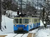 MOB - ABDe 8/8 4003 als Regio nach Montreux bei der einfahrt in den Bahnhof von Chernex am 03.12.2010
