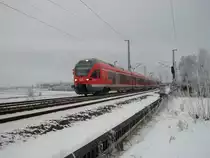 RE 33314 Binz-Stralsund am 08.Dezember 2010 beim Verlassen von Bergen/R�gen. 