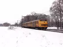 145 mit Regionalzug 7648 Zutphen-Arnhem bei Dieren am 9-2-1999. Bild und scan: Date Jan de Vries.