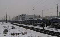 Mosolf Laaers Autozugtransportwagen mit Buick Regals nach Zeebruegge, in Rsselsheim Opelwerke; 22.12.2010