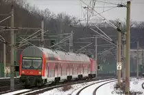 Hier verl�sst 112 113-6 mit einer RE2  Ersatzgarnitur  den Bahnhof Rathenow und ist auf dem Weg nach K�nigs Wusterhausen. 04.01.2011