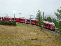 Allegra ABe 8/12 mit Regionalzug unterhalb von Alp Gr�m, fotografiert am 17.09.2010.