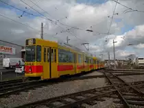 Motorwagen 262 f�hrt als Anh�ngewagen beim Depot H�slimatt vorbei Richtung Basel. Die Aufnahme stammt vom 19.01.2011.