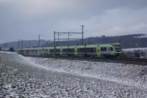 RABe 535 119-2 und RABe 535 113-5 fahren am 22.1.11 von Riedbach Richtung Bern.

