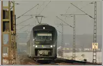  Ich bin ein Star hol mich hier raus , schrie das Teleobjektiv. Und da ich kein Unmensch sein will habe ich es getan. Teleschuss auf 440 605 als ag nach Plattling. (29.01.2011, Mangolding) 