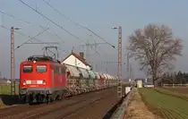 140 600-8 mit einem Kalkzug aus Oberhausen nach Aachen-West kurz vor Herrath, 29.1.11