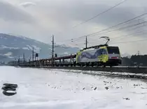 Die ES 64 F4-012 am 29.01.2011 mit einem Leeren  Autozug unterwegs bei Schwaz. 
