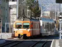 AAR - Regio nach Menziken mit dem Triebwagen Be 4/4 19 bei der einfahrt in den Bahnhof von Buchs/AG am 05.02.2011 

