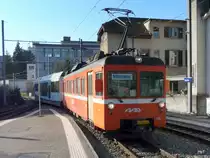 AAR - Regio nach Menziken mit dem Triebwagen Be 4/4 21 bei der einfahrt in den Bahnhof von Aarau am 05.02.2011 

