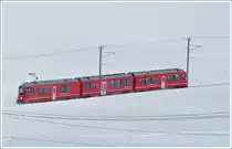 R1636 aus Tirano rauscht �ber die tiefverschneite Alp Bondo Richtung St.Moritz. (22.02.2011)