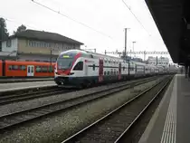 Ich bin neu! steht angeschrieben am RABe 511 002. Der Zug f�hrt gerade aus Solothurn aus Richtung Grenchen S�d. Der Zug f�hrt Testfahrten durch, 22.01.2011.