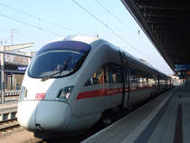 411 577-0(ICE-T Rathenow)als ICE1611 von Warnem�nde Richtung M�nchen Hbf kurz nach der Ankunft im Rostocker Hbf.(26.02.2011)