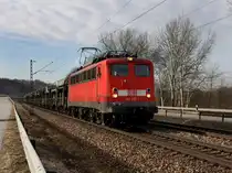 Die 140 217 am 24.02.2011 mit einem Leeren Autozug unterwegs bei Hausbach. 