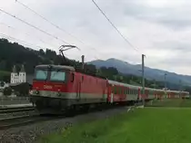 1144 067 mit REX 1509 W�rgl Hauptbahnhof-Salzburg Hauptbahnhof bei Brixen im Thale am 18-8-2010.