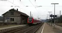 Lr 70614 (Villingen (Schwarzw)-Offenburg mit Schublok 146 236-5  Triberg  bei der Durchfahrt St.Georgen 10.3.11