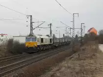 Die 247 047 am 12.03.2011 mit dem Sallerkalkzug unterwegs bei Obertraubling. 