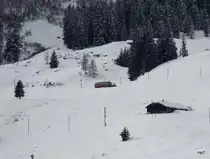 BLM - Triebwagen Be 4/4 unterwegs nach Winteregg- M�rren am 25.02.2011 .. Bild wurde mit viel, viel Tele vom Bahnhof Wengen aufgenommen 