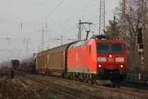 Bei sch�nem Abendlicht kam 185 081 mit einem gemischten G�terzug durch Ratingen-Lintorf.Aufgenommen am 4.3.11 