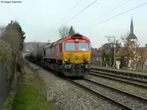 12.03.2011: Die DE 672 passiert mit einem �lzug den Haltepunkt Eutingen (Baden). Das Bild entstand legal vom Ende des Bahnsteig 2.