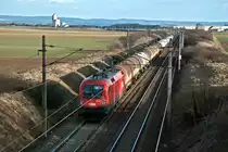 1116 117 bef�rdert diesen Kesselwagenganzzug Richtung Wien. Gramatneusiedl, am 15.03.2011.