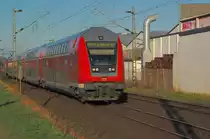RE11 auf auf der KBS 425 bei Anrath am 19.3.2011, geschoben von 112 134-2.
