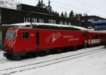 MGB 104 HGe4/4II unterwegs als R518 (Brig 06:23-Andermatt08:20) und weiter als R820 (Andermatt08:27-Disentis09:36) bei der Ausfahrt nach Disentis.
Wintermorgen in Andermatt.
25.01.2011