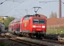 Eine Dostockeinheit bestehend aus einem Steuerwagen und drei normalen Wagen und der 145 036-0, fahren am sp�teren Nachmittag des 27.3.2011 in Richtung Dortmund. Hier ist der Zug der Linie RE4 kurz vor Erkelenz zu sehen, als er aus Richtung Aachen kommend den Fotografen passierte.