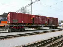 SBB - Beladener Rollb�cke der asm mit einem G�terwagen vom Typ  Slps-x 33 85 472 7 192-8 in Langenthal am 12.03.2011
