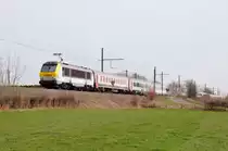 Auch hier wieder ein IC A Eupen - Oostende mit einem I10-Wagen direkt hinter der Lok (HLE 1341). Aufgenommen am 26/03/2011 bei Gemehret auf dem eingleisigen St�ck zwischen Eupen und Herbesthal.