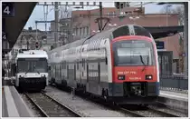526 680-4 nach Konstanz und S8 nach Pf�ffikon SZ mit 514 009-0 begegnen sich in Weinfelden. (30.03.2011)