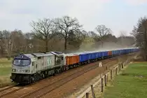 250 007-2 der ITL ist am 01.04.'11 mit einem Baustoff Ganzzug auf der KBS 235 gen Dresden unterwegs. Hier in der N�he von Fischbach