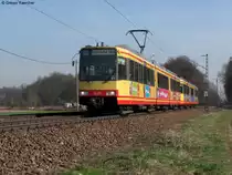 24.03.2011: Wagen 805 mit Werbung von Lago Bowlingcenter Karlsruhe und Wagen 801 mit Werbung der BGV als S31 nach Karlsruhe Hbf. Wegen seiner Versp�tung von ca. 7 Minuten wurde der Zug nach der Abfahrt im Bahnhof Weingarten auf das Gegengleis geleitet, damit der hinter der S-Bahn fahrende IC 2266 nicht gebremst wird und freie Fahrt hat. Aufgenommen zwischen Weingarten und Karlsruhe-Durlach.