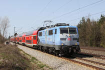 111 031 mit RE 79021 am 10.04.2011 zwischen Haar und Vaterstetten.
