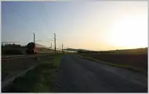 RJ 165 f�hrt bei Sonnenuntergang seinem Ziel Wien entgegen. Neulengbach, 10.04.11