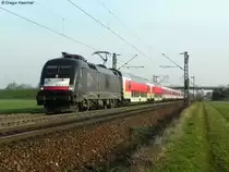 Am fr�hen Morgen des 25.03.2011 war die ES 64 U2 072 (182 572) mit den CNL 473 (Kopenhagen-Basel SBB) mit Kurswagen aus Minsk (BY) und Moskva Belorusskaja am Zugende unterwegs Richtung S�den. Aufgenommen bei Graben-Neudorf.