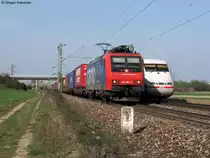 25.03.2011: Die 482 007-2 mit einem Containerzug Richtung S�den trifft auf 401 078  Bremerhaven . Aufgenommen bei Graben-Neudorf.