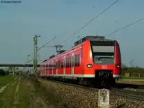 25.03.2011: Mit etwa 20 min�tiger Versp�tung kam die RB 38851 (Mannheim-Karlsruhe) an mir vorbeigerauscht. Der Zug wurde von 425 122 bzw. 425 622 gefahren.