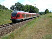 Im Einschnitt von Saiser bei Lietzow,entstand die Aufnahme am 06.Juni 2010 von 429 028 nach Sassnitz.