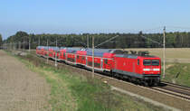 112 109 kommt hier mit dem RE1 nach Eisenh�ttenstadt durch Pillgram gefahren. 20.04.2011 

